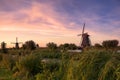 Kinderdijk windmills in the netherlands on sunset Royalty Free Stock Photo