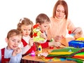 Kindergarden teacher with children. Royalty Free Stock Photo