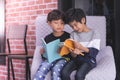 Kindergarten Boy are reading books together Royalty Free Stock Photo