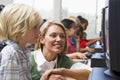 Kindergarten children learn how to use computers Royalty Free Stock Photo