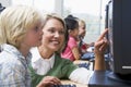 Kindergarten children learn to use computers Royalty Free Stock Photo