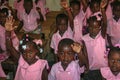 Kindergarten children in rural Haiti model their new friendship bracelets. Royalty Free Stock Photo