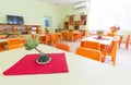 Kindergarten classroom with small chairs and tables Royalty Free Stock Photo