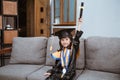 Kindergarten graduation. kid on graduation day at home Royalty Free Stock Photo