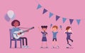 Kindergarten music party, black female teacher playing guitar Royalty Free Stock Photo