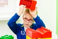 Kindergarten preschool classroom interior. Educational centre for children with computers, notebooks, development toys Royalty Free Stock Photo