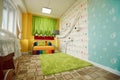 Kindergarten room decorated with colorful sofa. Royalty Free Stock Photo