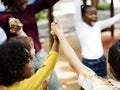 Kindergarten students with arms raised Royalty Free Stock Photo