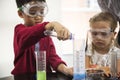 Kindergarten Students Mixing Solution in Science Experiment Laboratory Class Royalty Free Stock Photo