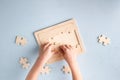 boy playing puzzle