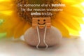Kindness inspiraitonal quote - Be someone else`s sunshine. Be the reason someone smiles today. With smile paper clip and sunflower