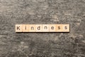 kindness word written on wood block. kindness text on table, concept Royalty Free Stock Photo