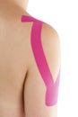 Kinesio tape on female shoulder