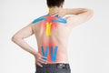 Kinesio tape, kinesiology taping on human back Royalty Free Stock Photo