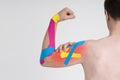 Kinesio tape, kinesiology taping on human hand Royalty Free Stock Photo