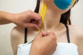 Kinesio taping. The physiotherapist applies kinesiology tape to the patient`s neck. Post-traumatic rehabilitation Royalty Free Stock Photo