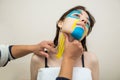 Kinesio taping. The physiotherapist applies kinesiology tape to the patient`s neck. Post-traumatic rehabilitation Royalty Free Stock Photo