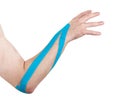 Kinesio tex tape therapeutic treatment of the elbow Royalty Free Stock Photo