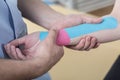 Kinesiology taping after wrist injury Royalty Free Stock Photo