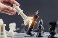 The King in battle chess game stand on chessboard Concept for company strategy