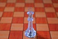 King or Bishop Alone on chess board Royalty Free Stock Photo