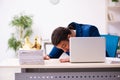 Young king businessman employee working in the office