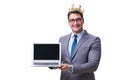 The king businessman holding a laptop isolated on white background Royalty Free Stock Photo