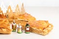 King cake or galette des rois in French. Traditional epiphany pie with golden paper crown Royalty Free Stock Photo