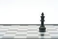 King Chess is placed on a chessboard.using as background business concept and Strategy concept with copy space for your text or Royalty Free Stock Photo