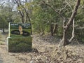 A king cobra snake,Ophiophagus hannah, on the sign board at Karnataka tiger reserve. The road goes through deep forest of the Royalty Free Stock Photo