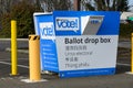 King County drive up ballot drop box with yellow protective posts