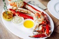 King Crab Cluster with sauces Royalty Free Stock Photo