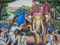 A king on an elephant gives water to travelling lord Buddha and his followers Royalty Free Stock Photo