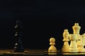 King encounters against powerful pawn in chess game, business competitive concept Royalty Free Stock Photo