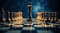 a King engaged in a chess battle, standing on a chessboard against a black isolated background. This image Royalty Free Stock Photo