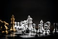 King golden chess standing confront of the silver chess team concepts of leadership and business strategy