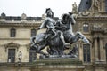 King Louis XIV Statue at Cour Napoleon the entrance to the Musee du Louvre