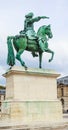 King Louis XIV statue in front of Palace of Versailles Royalty Free Stock Photo