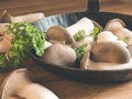 King oyster mushroom with parsely in iron pan Royalty Free Stock Photo