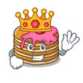 King pancake with strawberry mascot cartoon
