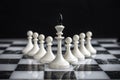 The king and pawns on a chess Board on a dark background Royalty Free Stock Photo