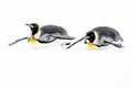 King Penguins sledding on ice Royalty Free Stock Photo