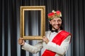 King with picture frame Royalty Free Stock Photo