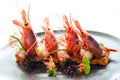 King prawns with crisp seafood rice. Royalty Free Stock Photo