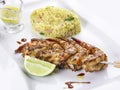 King prawns grilled on a skewer with rice Royalty Free Stock Photo