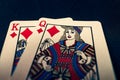 King and queen of diamonds playing cards on black background Royalty Free Stock Photo