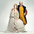 King, Queen and royal portrait of a couple in studio for renaissance, history and fantasy cosplay art. Medieval man and
