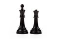 King and queen, two simple chess figures isolated on white, cut out. Royal couple, royalty abstract concept, pair of game pieces Royalty Free Stock Photo