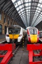 King's Cross station with a class 700 Thames link train and class 800 Azuma train next to each other at the buffer Royalty Free Stock Photo
