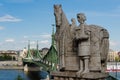 King Saint Stephen statue on the Gellert Hill and the Liberty Bridge over the Danube river in the background, Budapest, Hungary